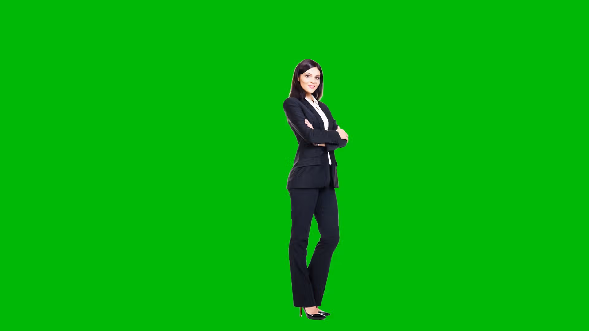 Woman in business attire on green screen